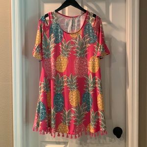 Adorable pineapple dress with tassels and pockets!